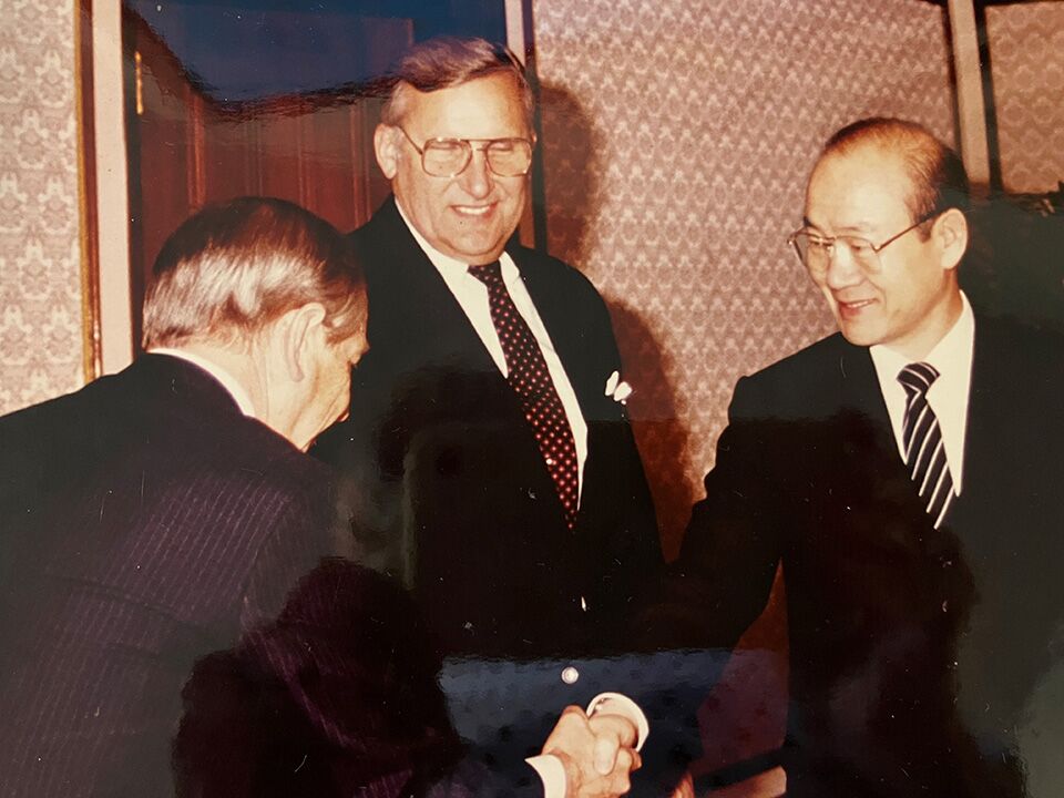 Russell Bliese gets a handshake from the President of South Korea