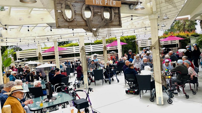 Residents enjoy the opening of the Pier outdoor dining space