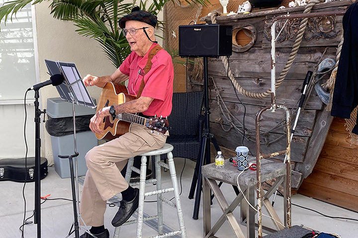 "Guy with a Guitar" Rod Sanders plays at our outdoor dining space, The Pier 