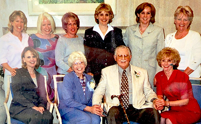 Virginia and Fred Jessup, pictured seated surrounded by their eight beautiful daughters