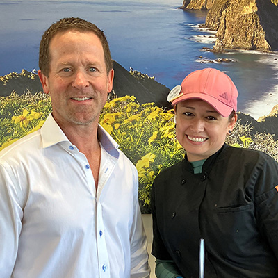 Employee of the Month December 2025 - Saray Fajardo with Executive Director Evan Grannucci