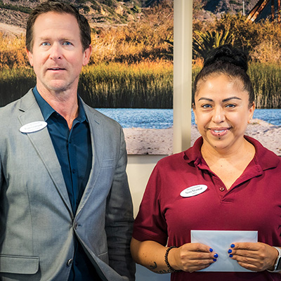 Nora Monreal - Ventura Townehouse Employee of the Month January 2026 with Executive Director Evan Granucci