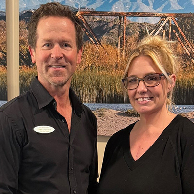 Michelle Block February 2026 employee of the month pictured with Evan Granucci, Executive Director